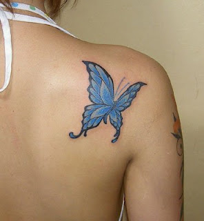 Blue Butterfly Tattoo Design on Girls Upper Back