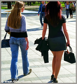 Girl in blue jeans on the street