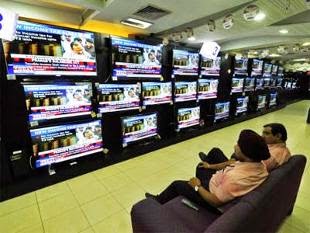 http://economictimes.indiatimes.com/news/economy/policy/budget-2014-colour-tv-computers-to-be-cheaper-cigarettes-gutka-costlier/articleshow/38134388.cms