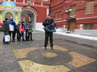 a man holding a bag on his back