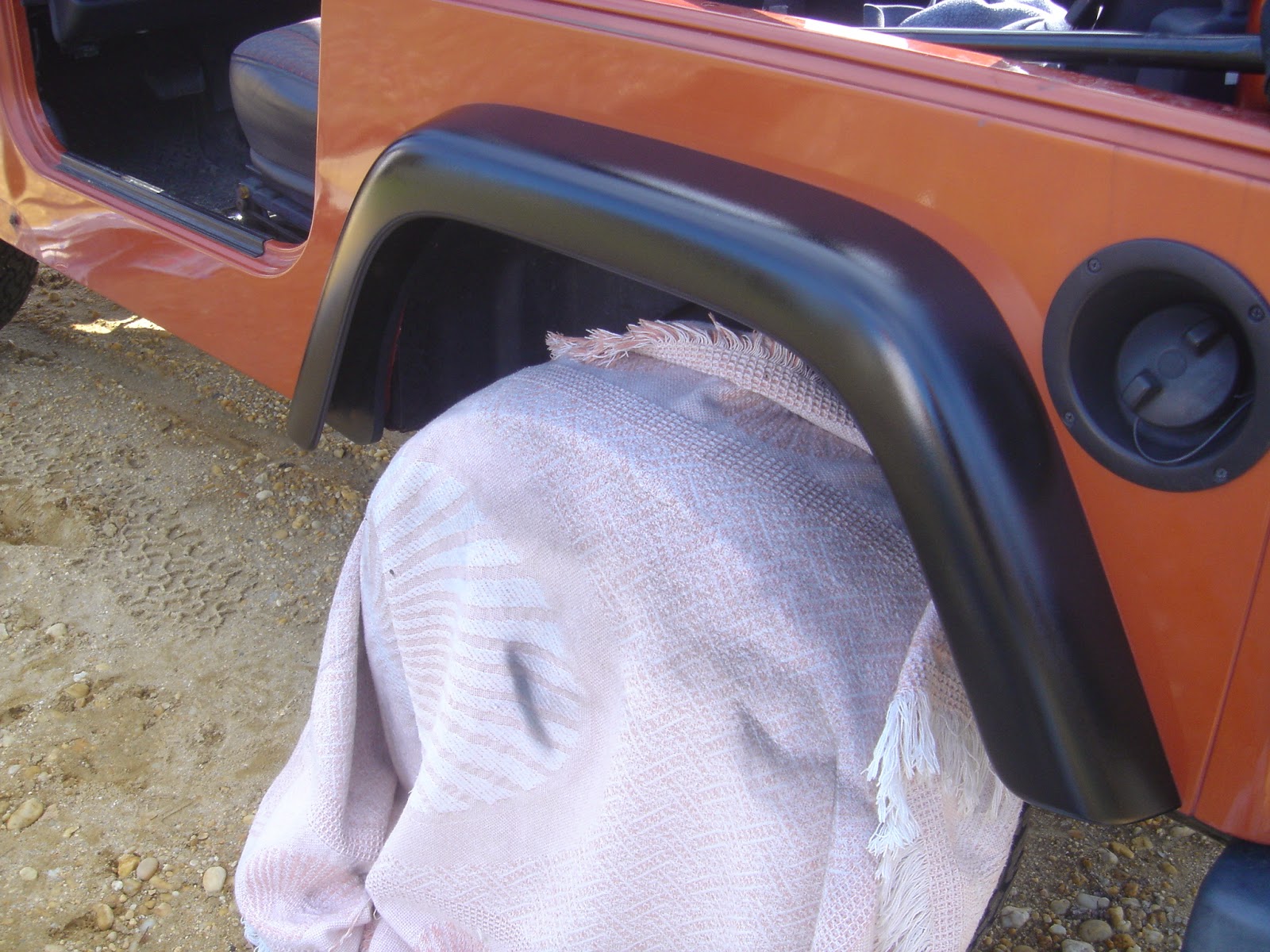 JeepGuide Krylon Fusion On Faded Fender Flares