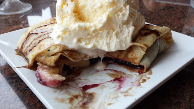 three-berry banana crepe with vanilla ice cream