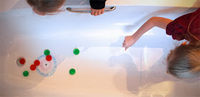 http://alphamom.com/family-fun/crafts/winter-olympics-craft-ice-cube-curling-in-your-bath/