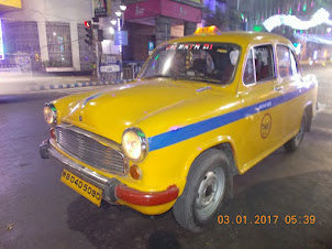 "AMBASSADOR TAXI" a trademark utility vehicle of Kolkata.