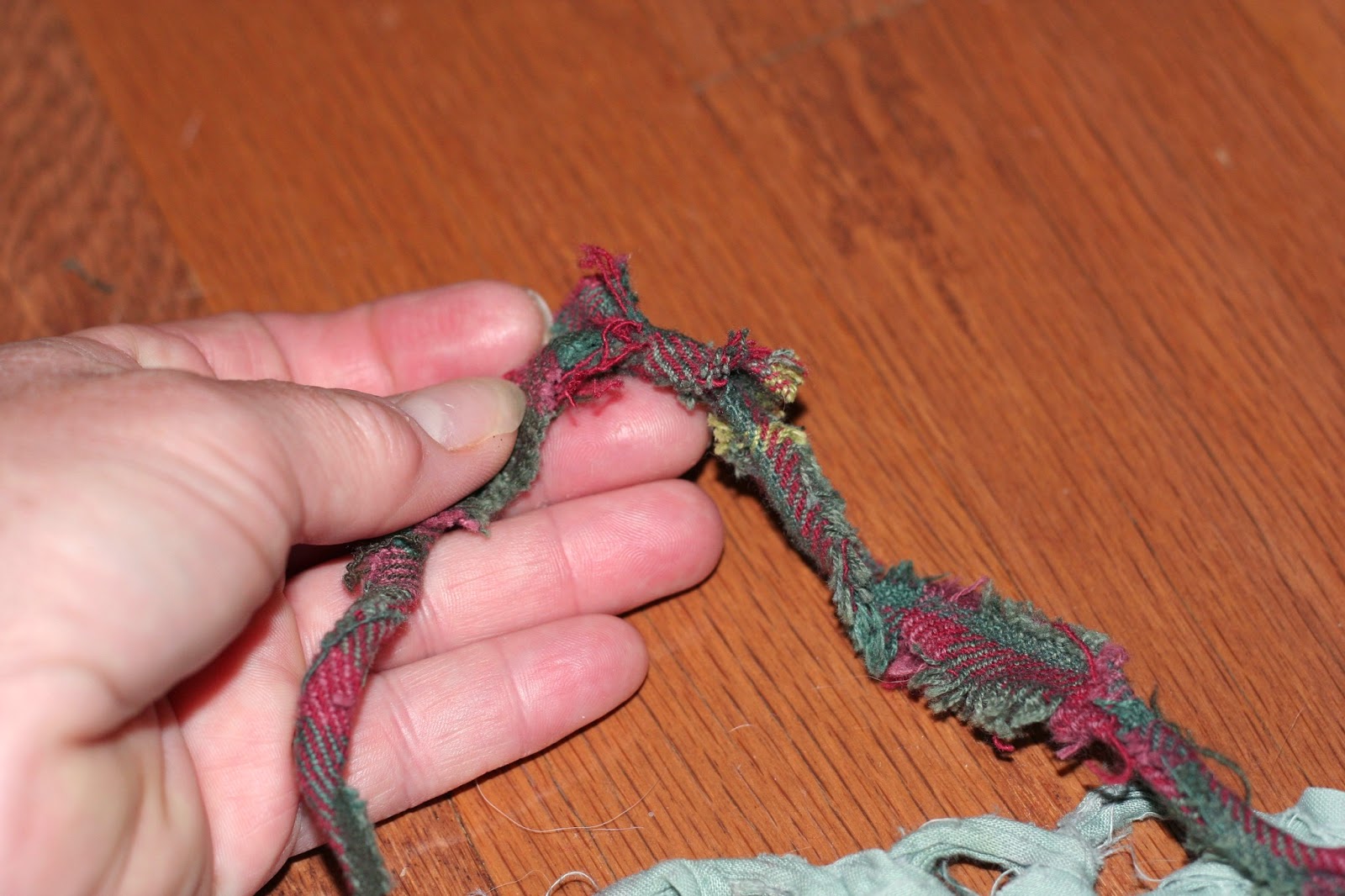 Whispers From Elizabeth Repairing a Rag Rug