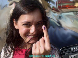 Indian Celebrity actress Diya Mirza after voting election showing dot on finger