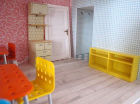 Interior of the ground floor of a half-built Lundby dolls' house.
