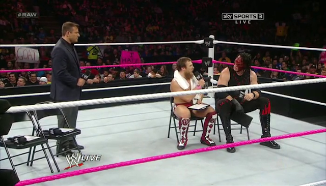 Kane Daniel Bryan and Matt Striker during the segment of a game show