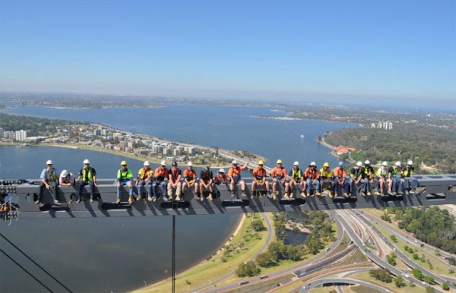 City Square Tower in Australian Perth Construction workers on the skyscraper with the city in the background