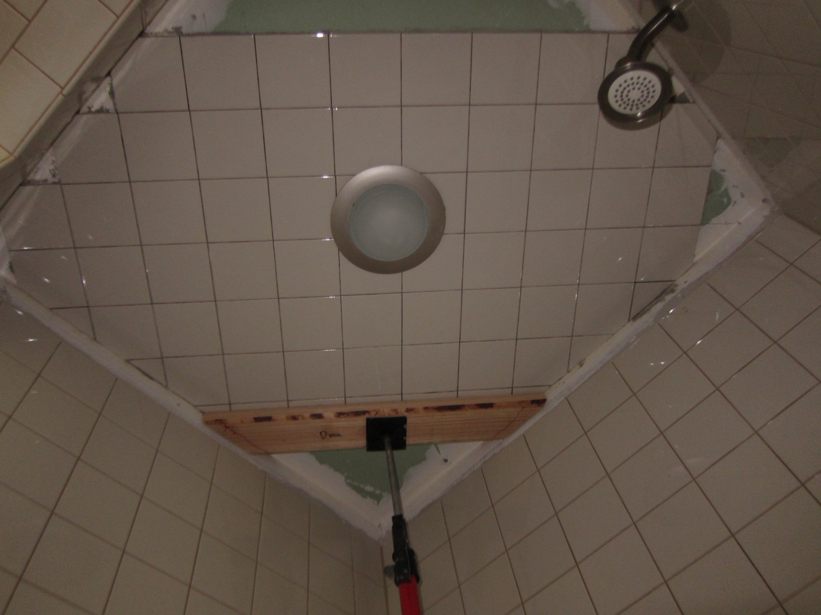 Chainsaw Yogi Gravity Defying Tile Ceramic Tile Really Does Stick To The Ceiling With A Little Help From My Handy Red Floor Jack Putting Bit Of Pressure On It Until Dries