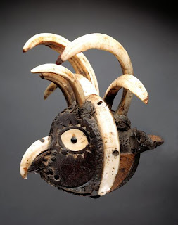 Leti Island Indonesian mouth mask depicting the head of a bird