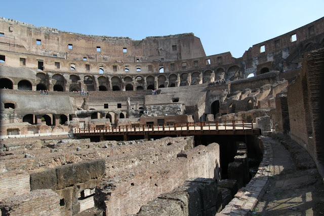 A close view of the hypogeum, the 1st tier and top tier seating in the Roman Colosseum in Rome, Italy A close view of the hypogeum, the 1st tier and top tier seating in the Roman Colosseum in Rome, Italy