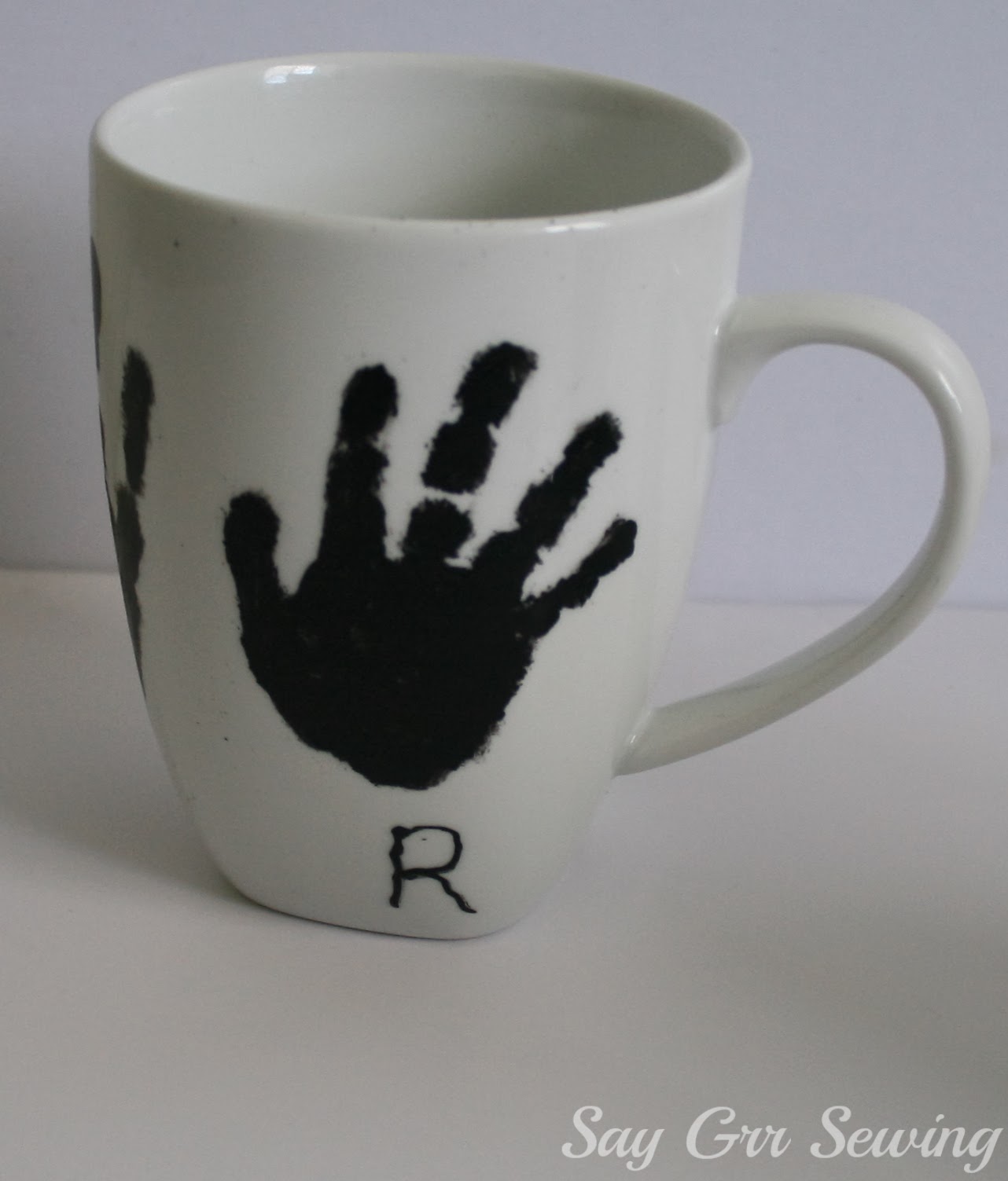 Say Grr Sewing Handprint Mugs