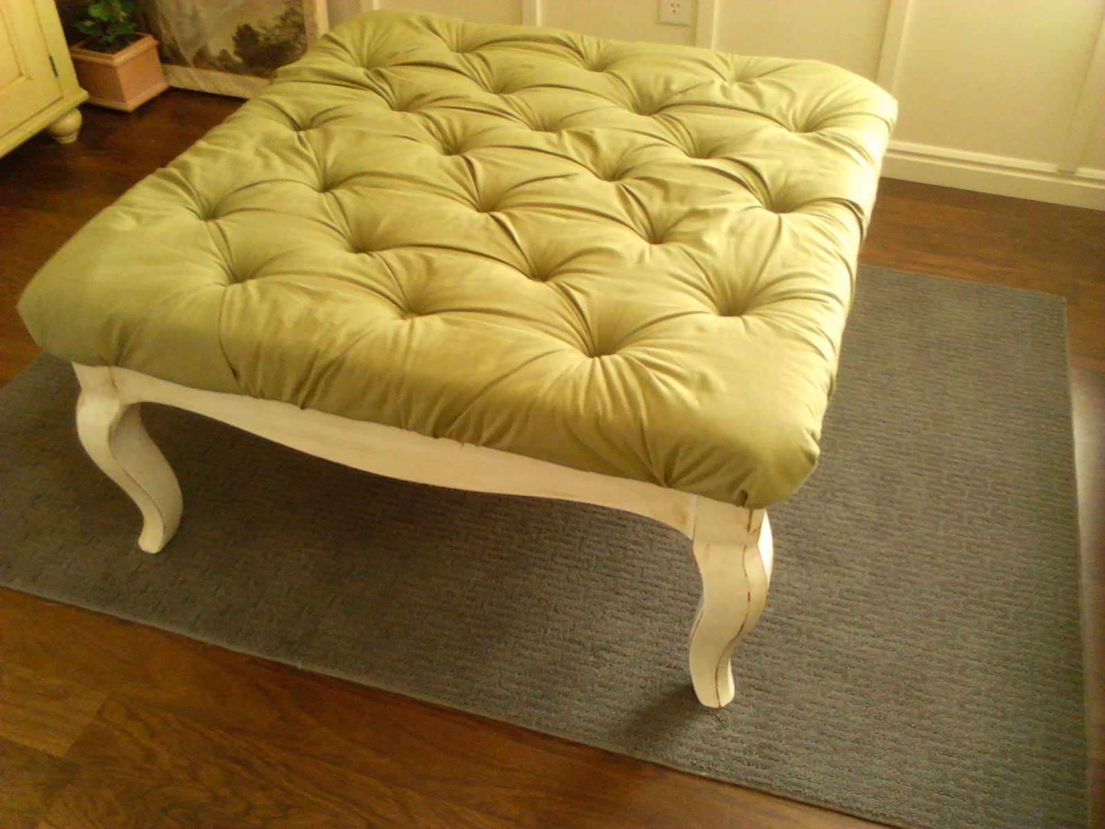 Worth the Hassle DIY Coffee Table Turned Tufted Ottoman