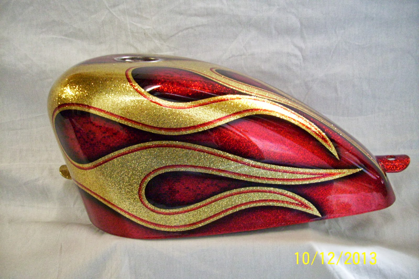 FlameThrowerCustoms: Gold metal-flake and Kandy Apple Red... it's an