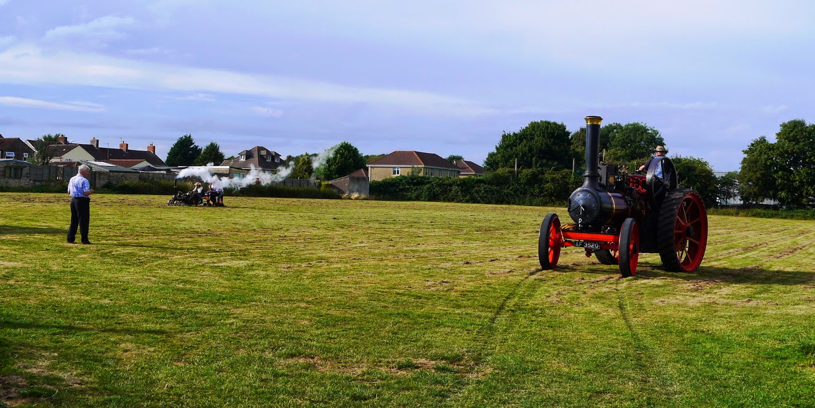 Steam engines in a field
