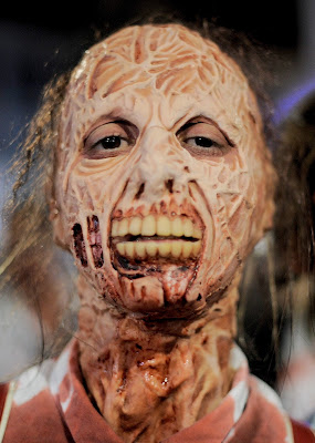 People dressed as zombies take part in a Zombie Walk in Sitges, near Barcelona, on October 12, 2013.