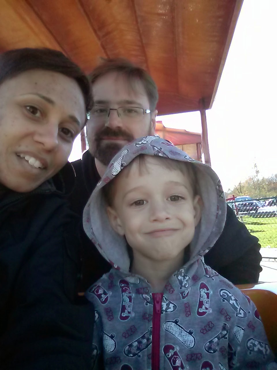 family selfie on Big Apple Colborne train copyright 2014 OneQuarterMama.ca