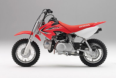 Honda CRF50F 2011 enduro red side view