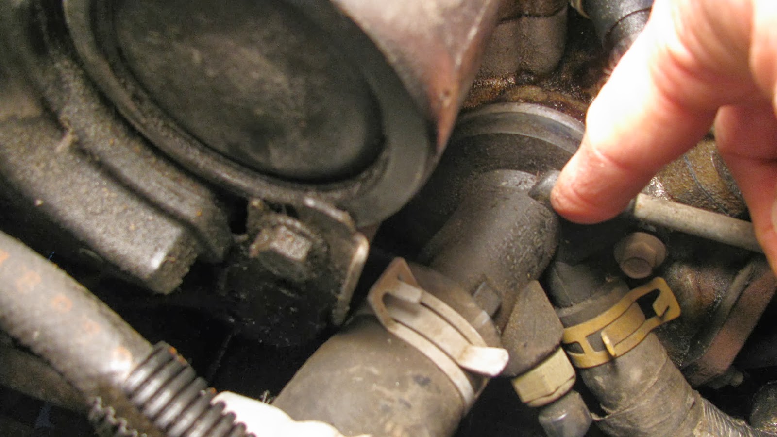The Original Mechanic How to fix a coolant leak at the water outlet on