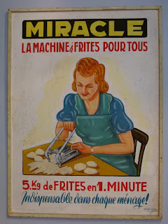 a sign with a woman cutting potatoes