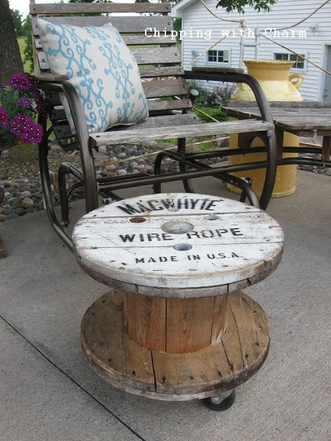 Super cool spool ottoman or side table, by Chipping with Charm, featured on I Love That Junk