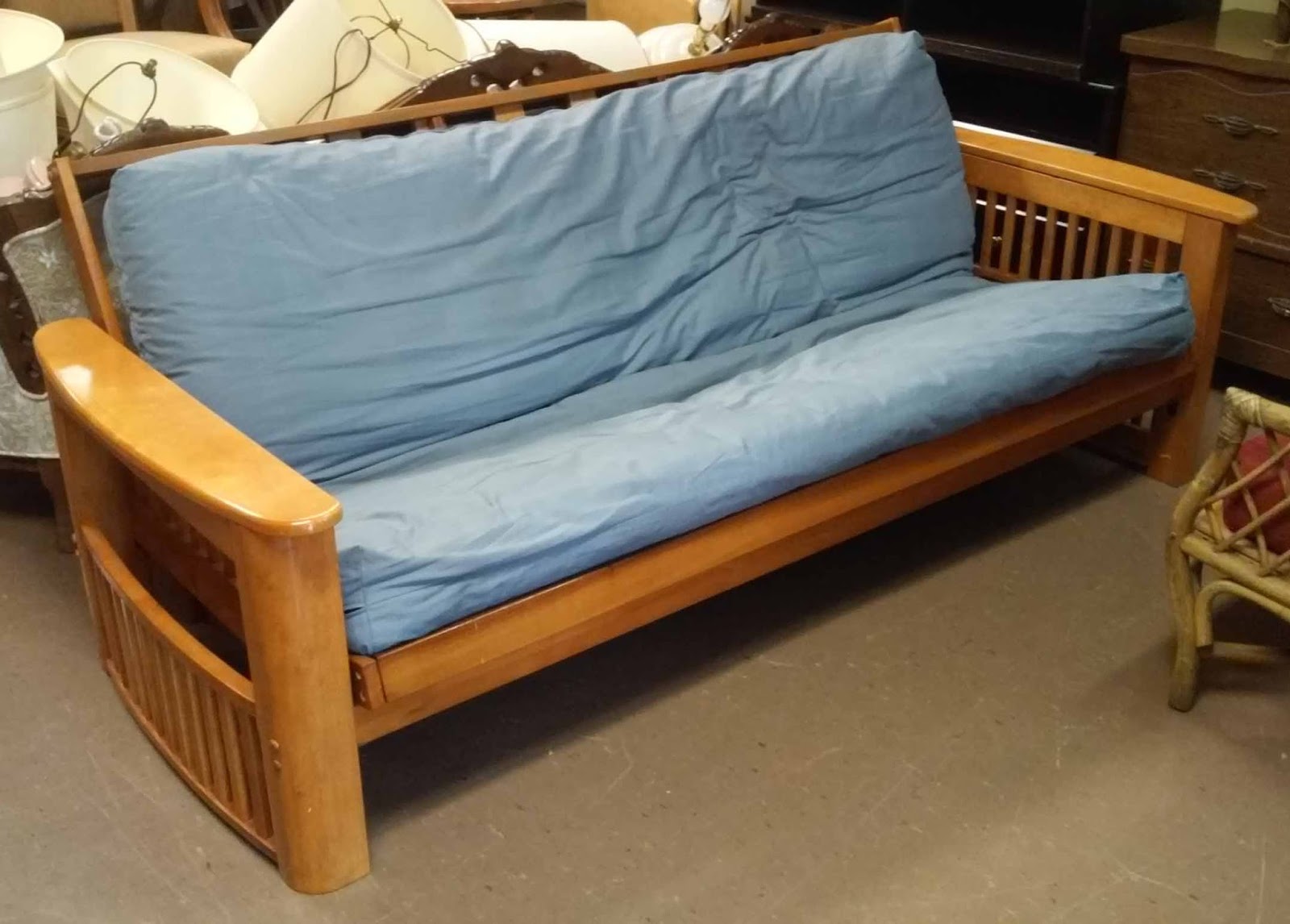 UHURU FURNITURE & COLLECTIBLES SOLD **REDUCED** Futon with Arm Storage