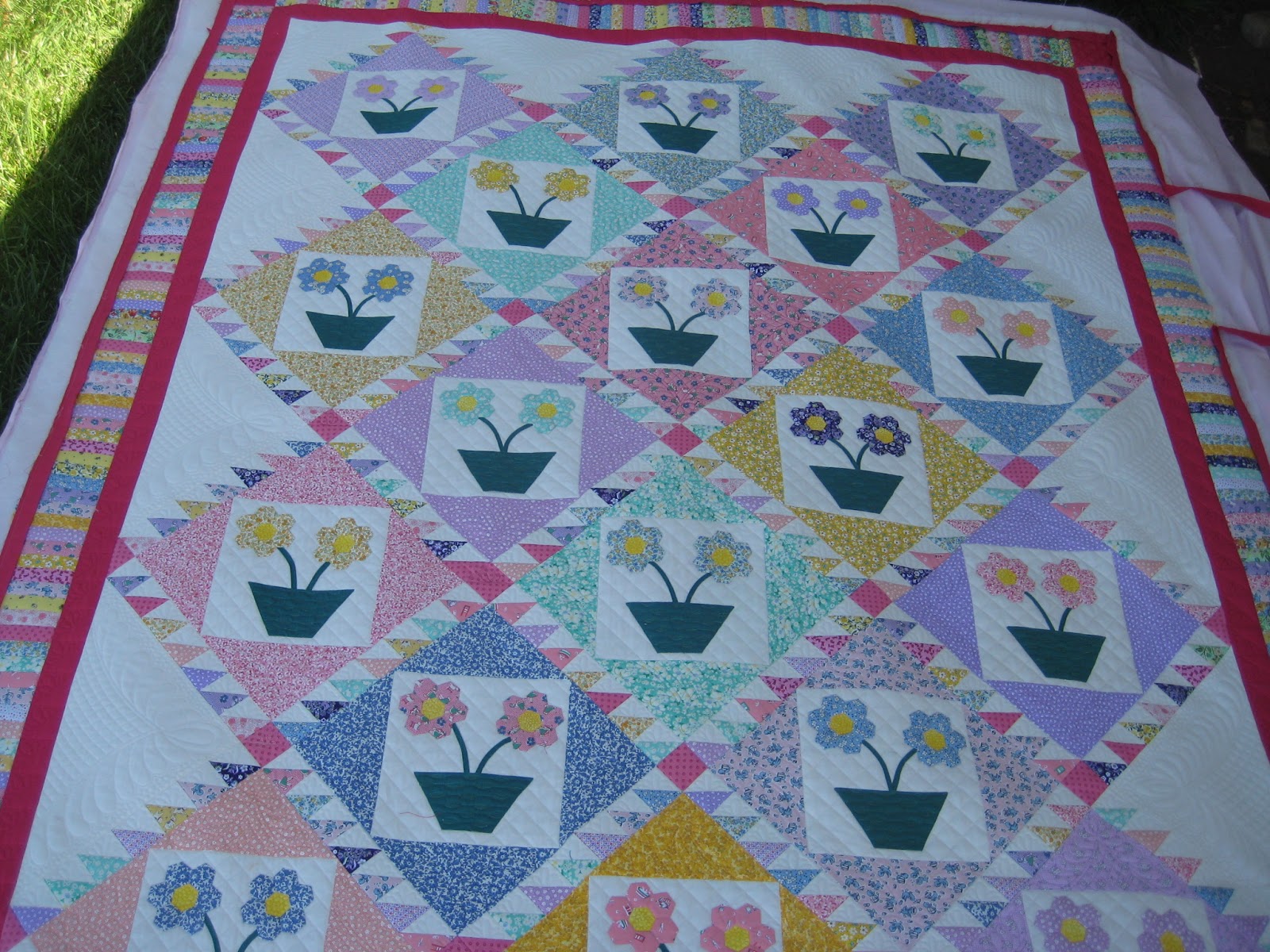 Threads on the floor Grandmother's Flower Pots Finished