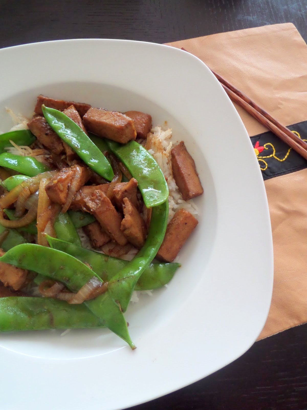 Pork and Peas Stir Fry:  A sweet and spicy stir fry made with leftover Herb Roasted Pork Tenderloin and a variety of peas.
