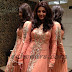 Kajal Light Orange Net Kameez