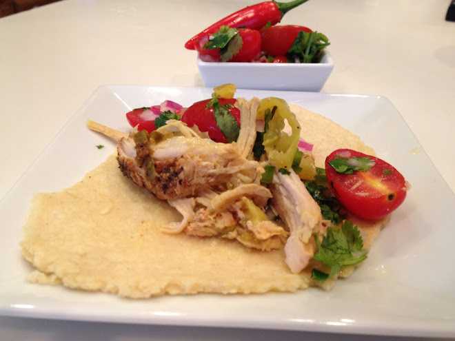 Handmade corn tortillas with slow roasted pork and banana peppers