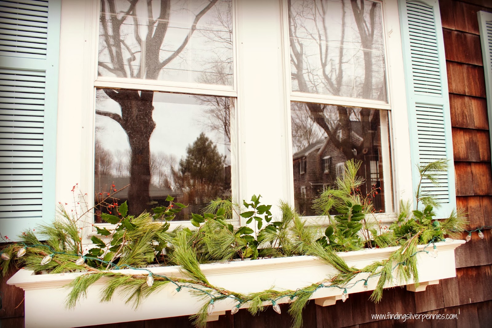 Antique Sleds, Fairy Lights and Garlands Finding Silver Pennies