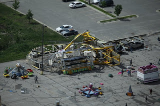 A ferris wheel blew over at an amusement park.