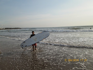 A surfer on Kuta beach.