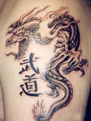 welsh dragon tattoo designs. tribal dragon tattoos design