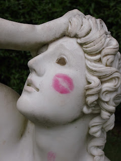 a statue with a lipstick print