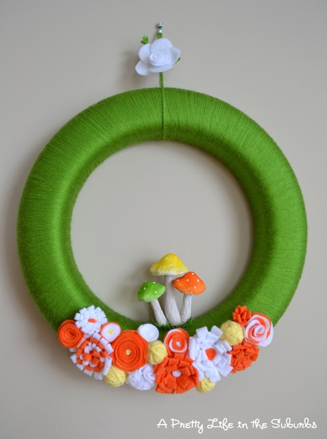 Green Yarn with orange, White and yellow felt flowers image by A Pretty Life in the Suburbs