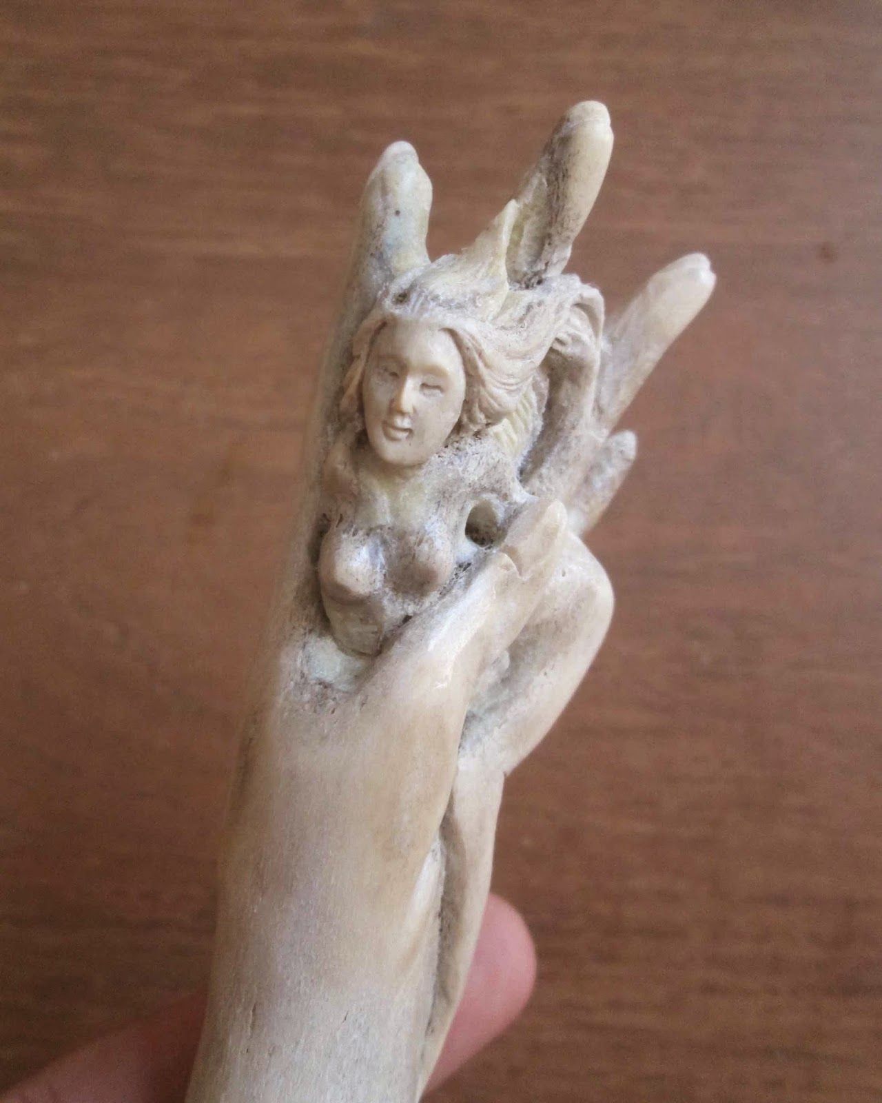 Hand Carved Hand Holds Woman Handle in Antler Hand Carved Hand Holds Woman Handle in Antler
