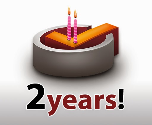 3-D illustration of a cake with 2 candles, with "2 years!" printed underneath