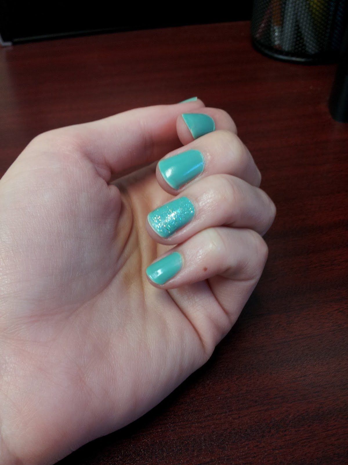 This is Essie's Turquoise and Caicos with a topcoat of Sally Hansen's Hard