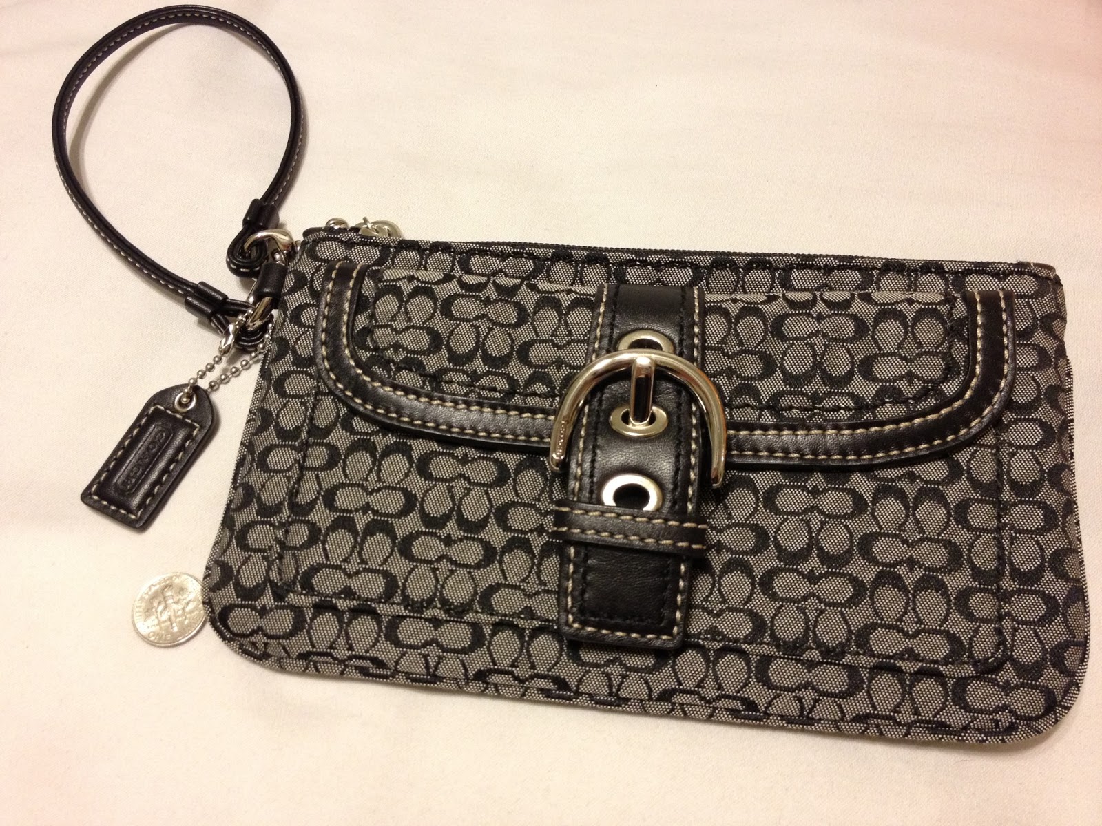 assorted coach wristlets