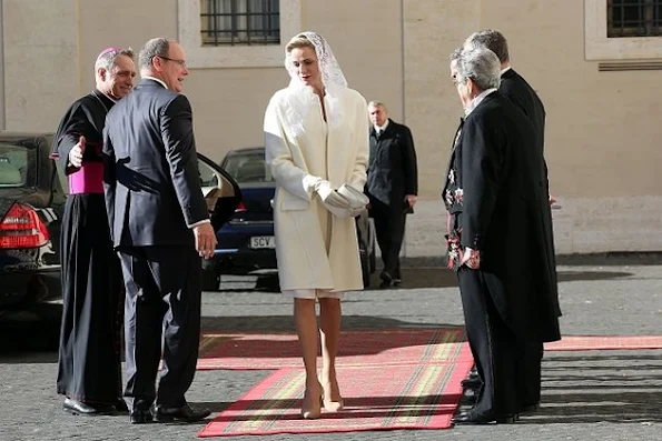 Princess Charlene of Monaco and Prince Albert II of Monaco arrives at the Apostolic Palace for an audience with Pope Francis on January 18, 2016 in Vatican City