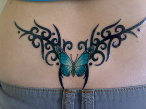 Lower Back Blue Butterfly Tattoo with Tribal Design