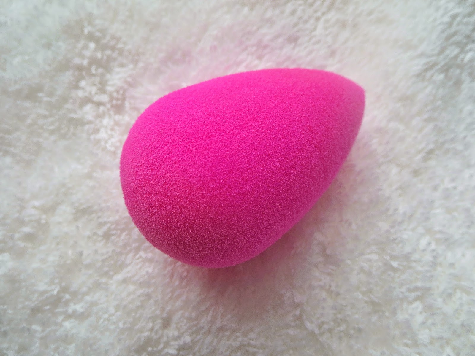 a picture of a clean and wet Beauty Blender