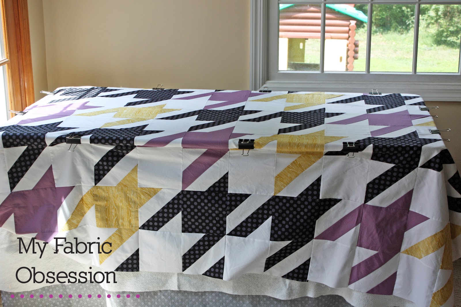 My Fabric Obsession Tutorial Pin basting on a table
