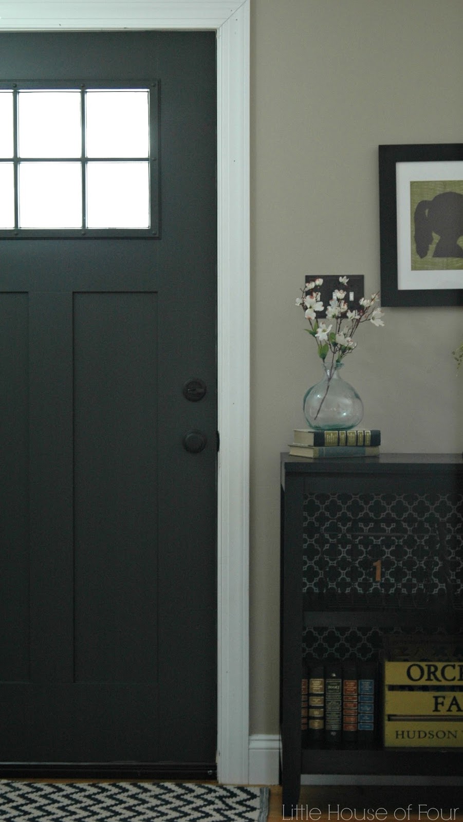 Updating the entryway with Sherwin Williams Iron Ore Little House of
