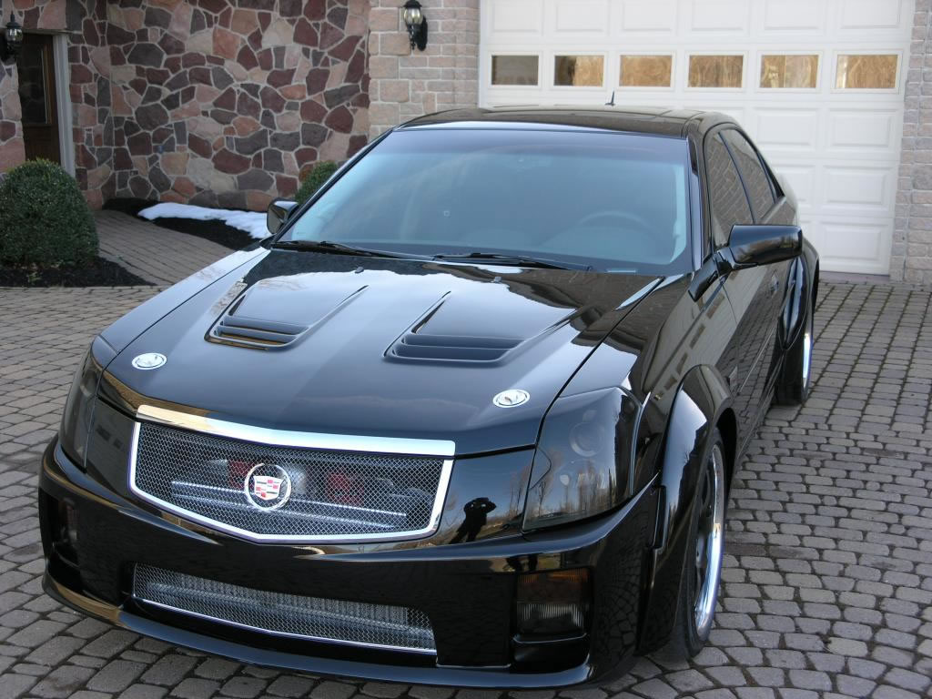 http://1.bp.blogspot.com/-6A-KeOIFXFE/TrzZTzxvr0I/AAAAAAAAECM/n3LhgY15Joo/s1600/2011-cadillac-cts-v-wallpaper-picture-14276.jpg