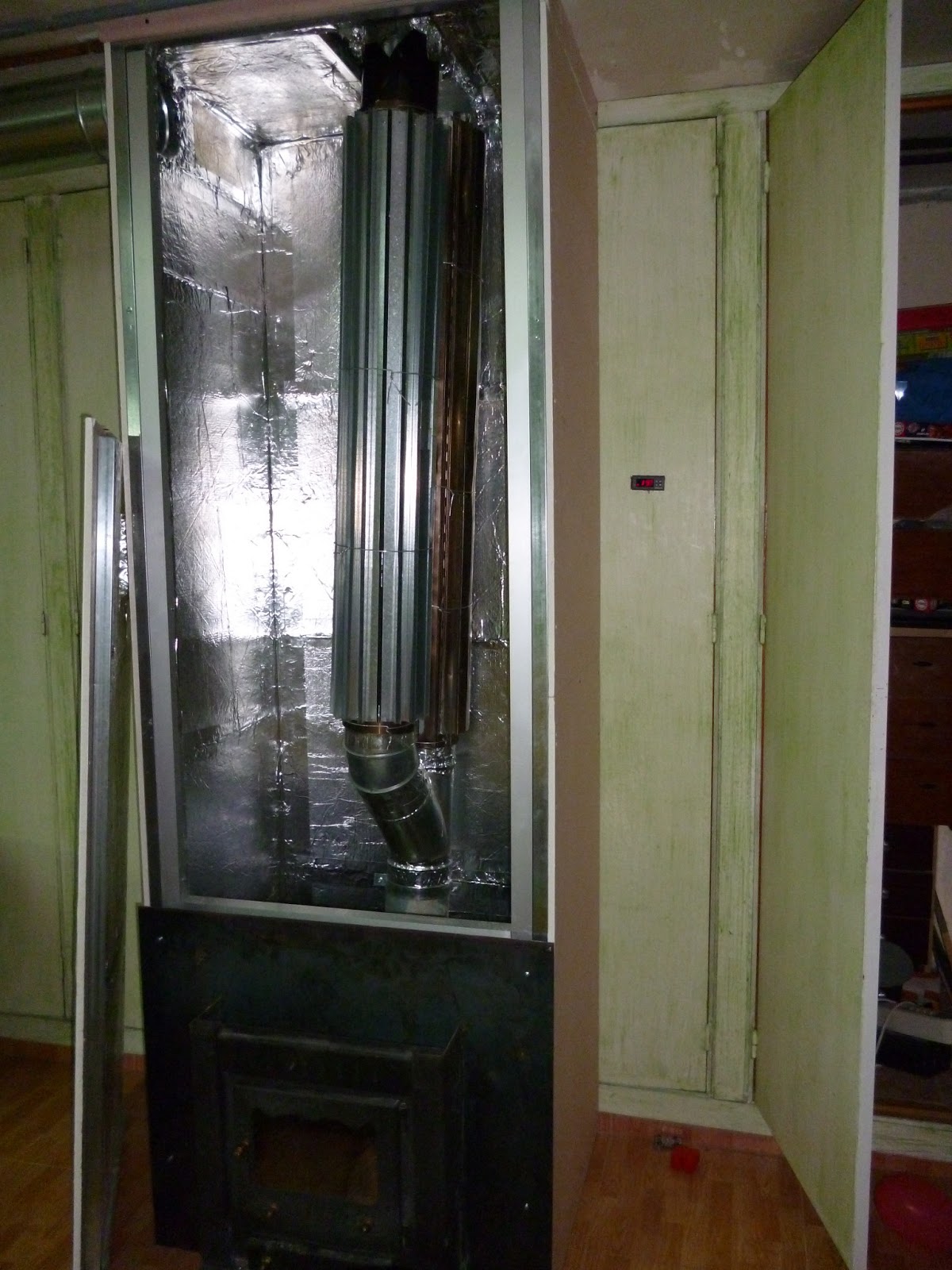 CALEFACCIÓN POR AIRE CALENTADO CON ESTUFA LEÑA O CASCARA: PROYECTO