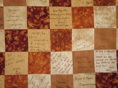A quilt each guest gets a patch to sign and leave their well wishes on