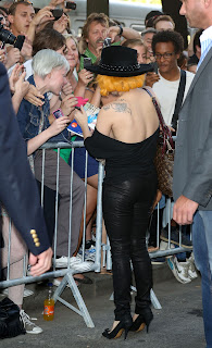 Lady Gaga signing some autographs